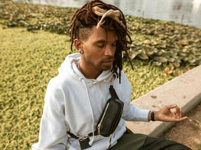 Detail of a person hands in a mudra position