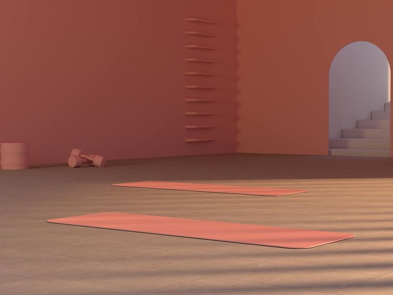 Minimalist yoga equipment and mat in a clean room